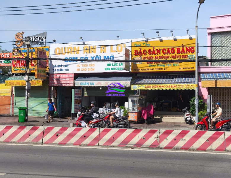 Đất giá: 150ty, DT: 1170m2, full thổ cư, 2 KIOS + 96 PTRO, mặt tiền đường Huỳnh Tấn Phát, Q7